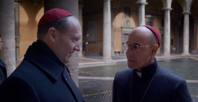 (L to R) Ralph Fiennes as Cardinal Lawrence and Stanley Tucci as Cardinal Bellini in director Edward Berger's CONCLAVE, a Focus Features release. Credit: Courtesy of Focus Features. © 2024 All Rights Reserved.